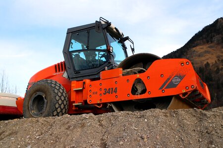 Construction machine road construction compaction