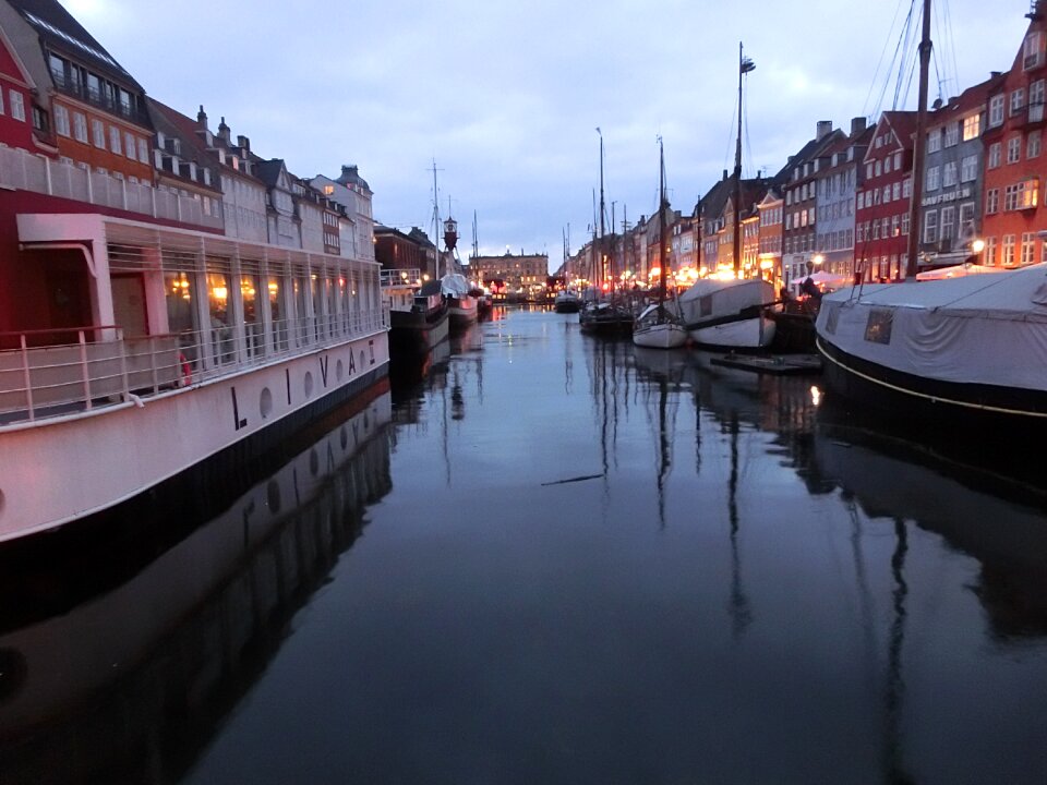 Port sailing ships reflections