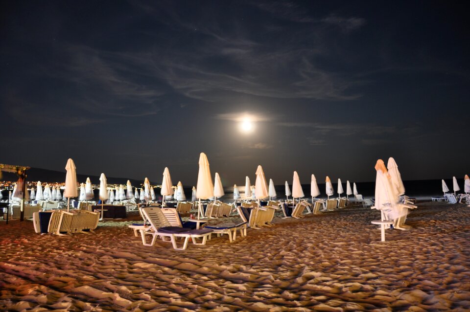 Sun loungers evening moonlight