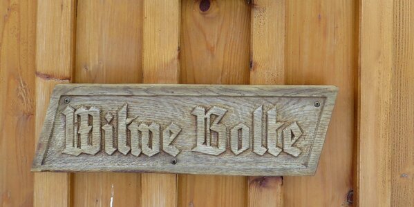 Wooden sign fairy tales widow bolte