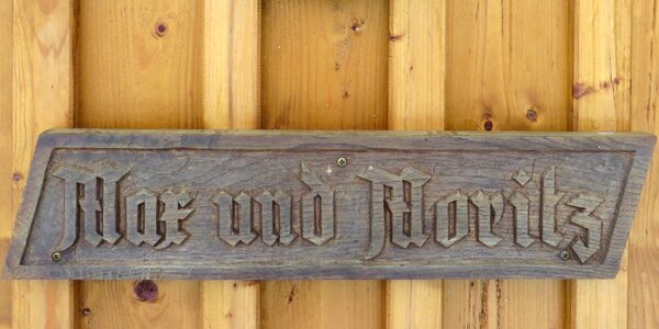 Wooden sign fairy tales max and moritz