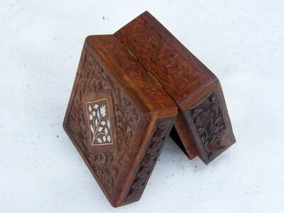 Brown carved casket