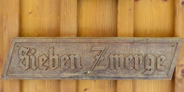 Wooden sign fairy tales seven dwarfs