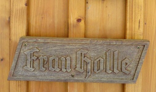 Wooden sign fairy tales mrs holle photo