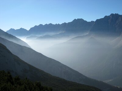 Mountains fog backlighting
