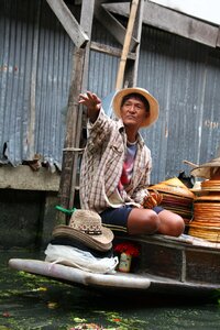 Thai man selling photo