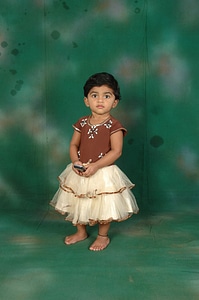 Green background standing kid