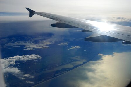 Reflection airplanes clouds photo