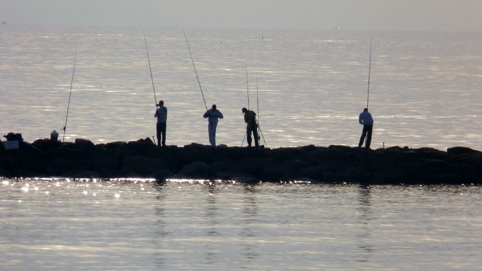 Fishermen sea fishing photo
