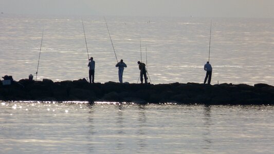 Fishermen sea fishing photo