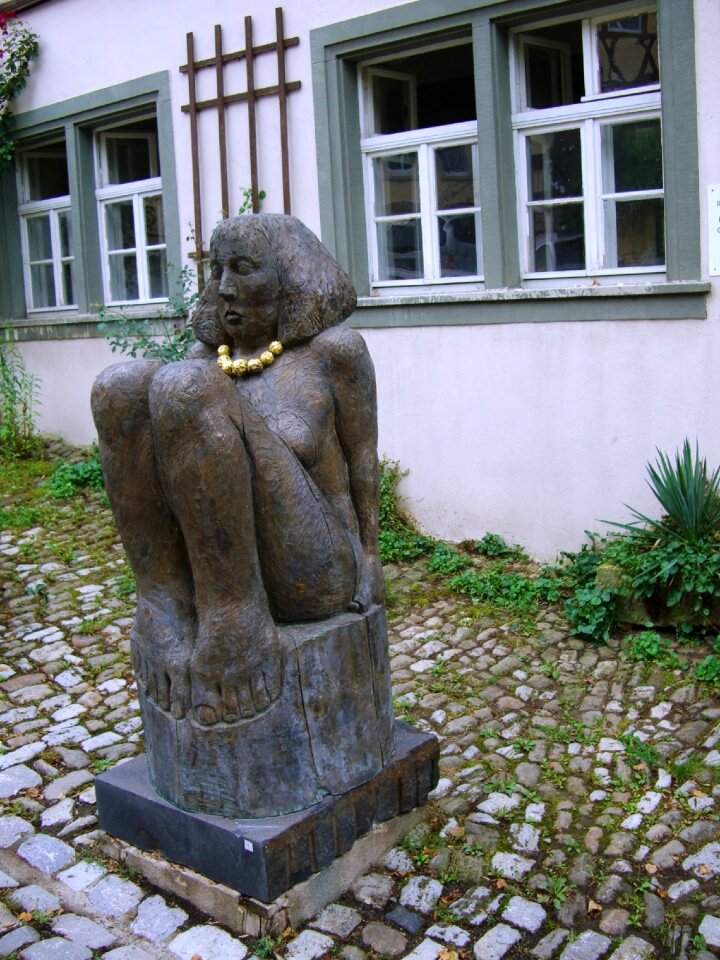 Stone figure girl gold chain