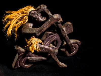 Wild hairstyle wood model art from thailand