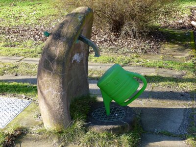 Watering can fountain cemetery