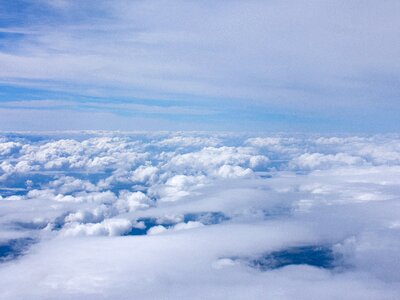 Above the clouds sky blue photo