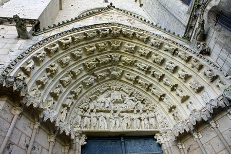 Church door elaborate door arch curved stone entrance photo
