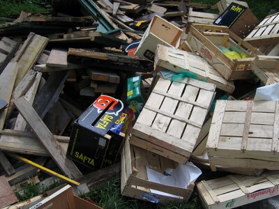 Crates scrap waste pile photo