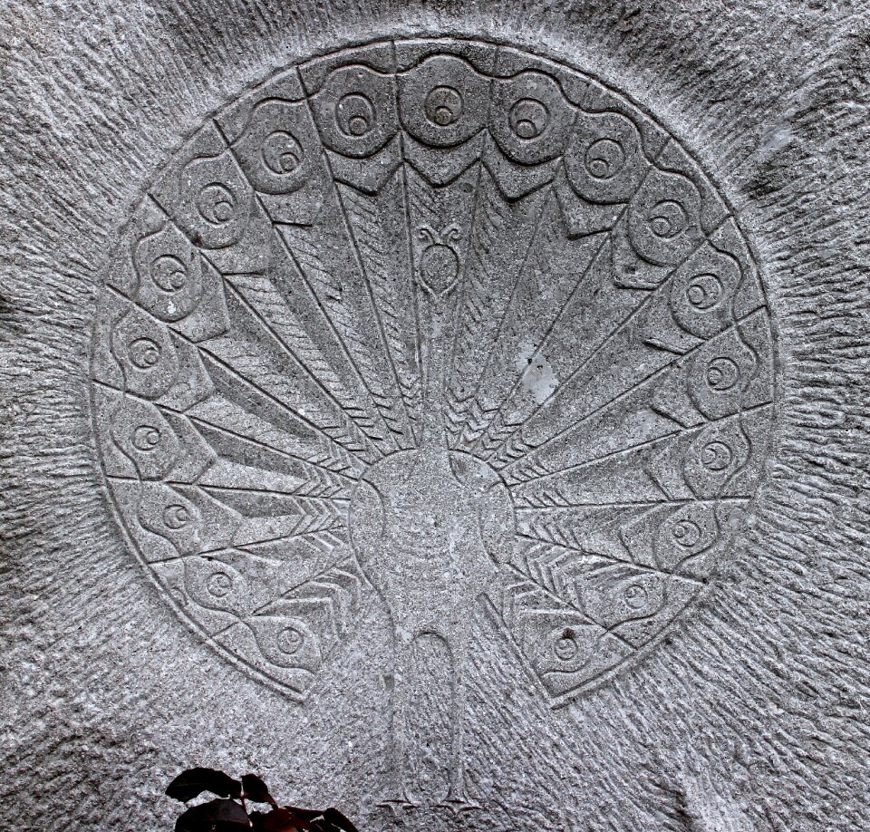 Wheel of life bird stone figure