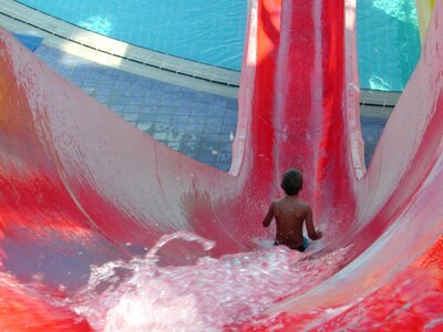 Child slips water park swimming pool