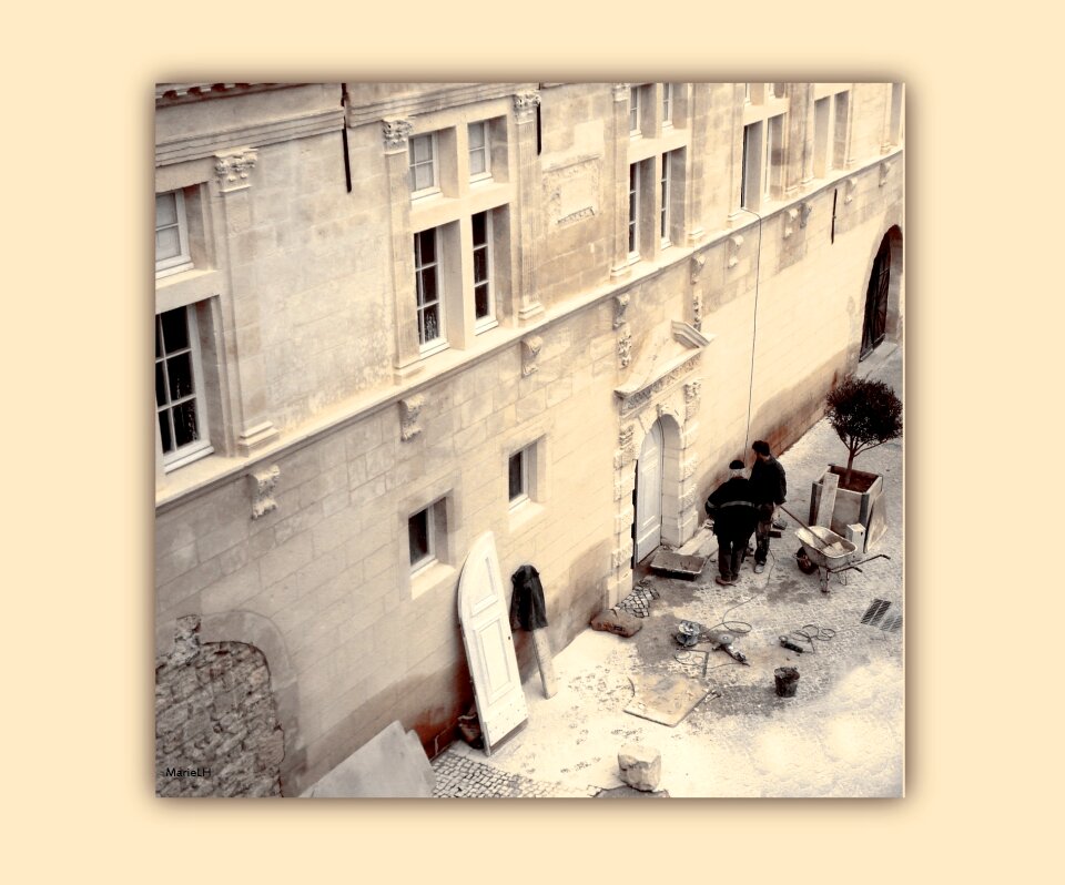 Workers building houses