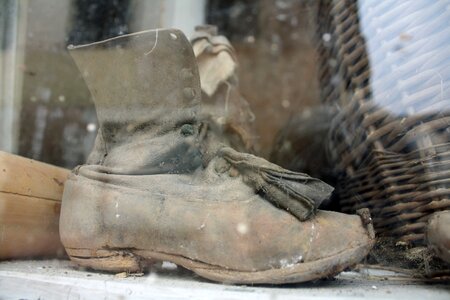 Dirty window dirty old boot photo