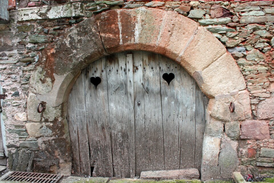 Arched doorway wooden door ancient entrance