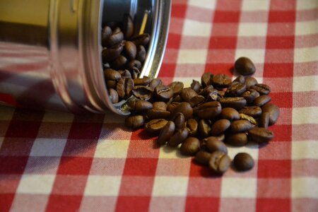 Grain coffee in grain grinding photo