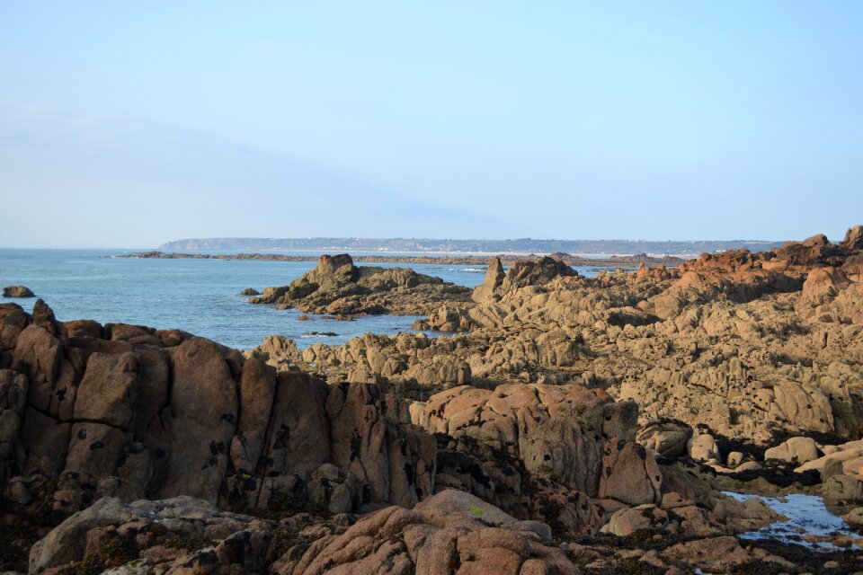 Rock pools coastline blue sky