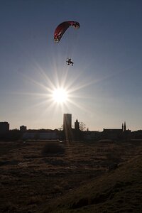 The sun hang glider flying
