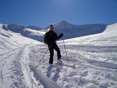 Depart winter mountaineering ski track photo