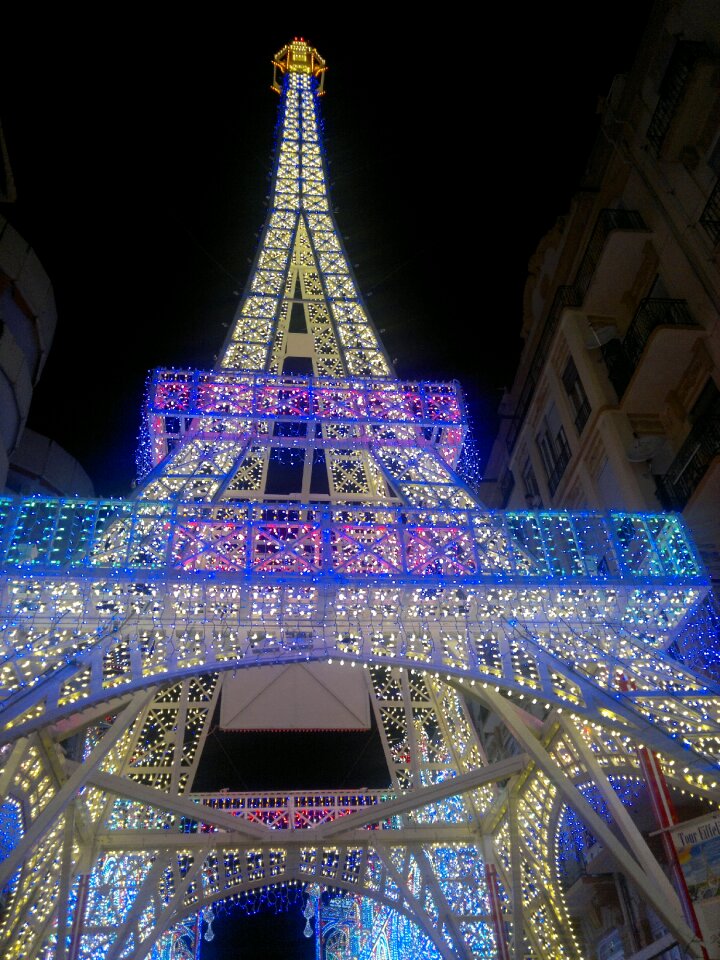 Parties tower lit street