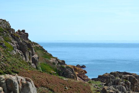 Rock pools coastline blue sky photo