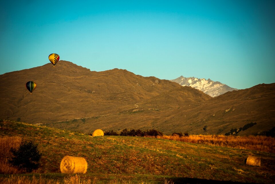Hay rolls mountain sea