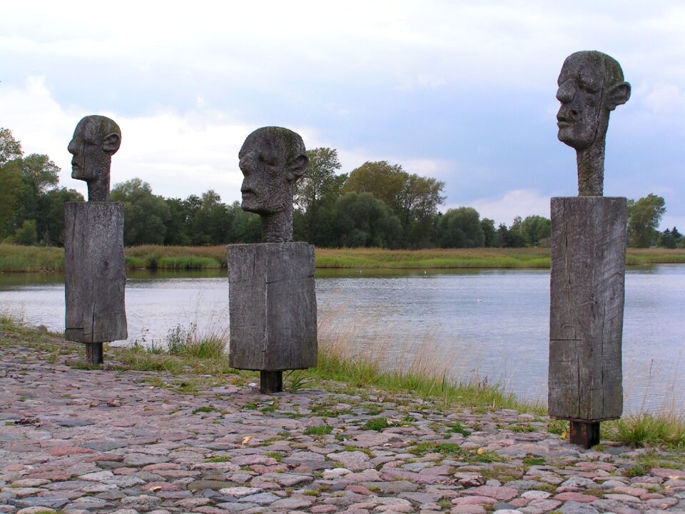 Weathered men heads