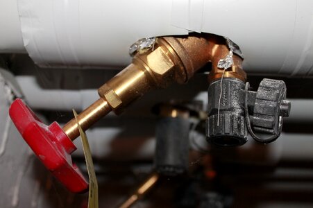 Heating pipes valve screw cap photo