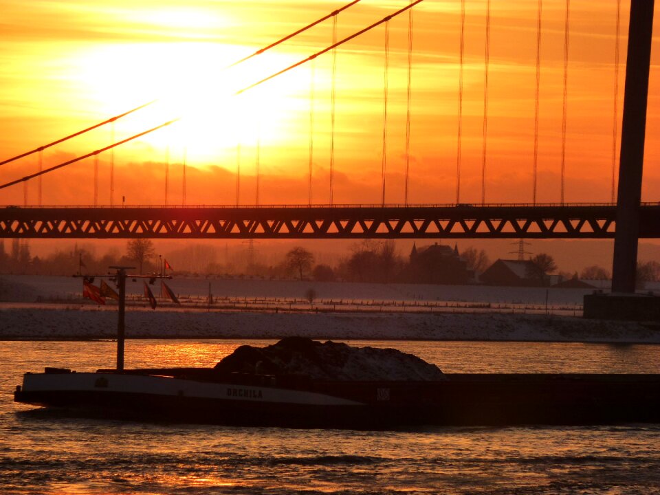 Rheinbrücke sunset ship