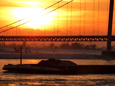 Rheinbrücke sunset ship photo