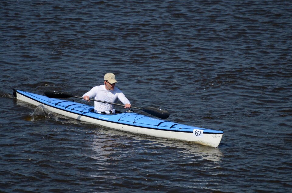 Man boat adventure photo