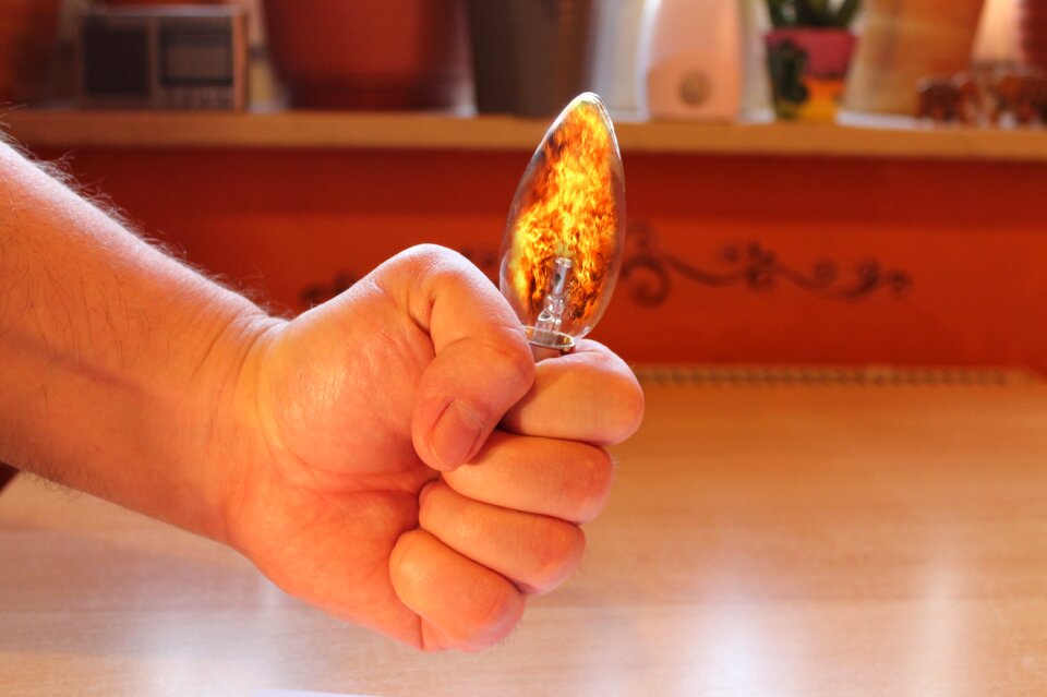 Hand light bulb fire