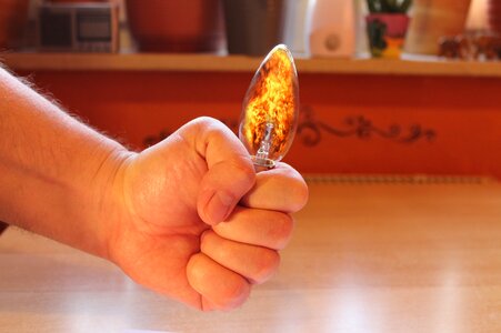 Hand light bulb fire