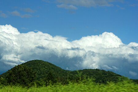 Hill landscape clouds photo