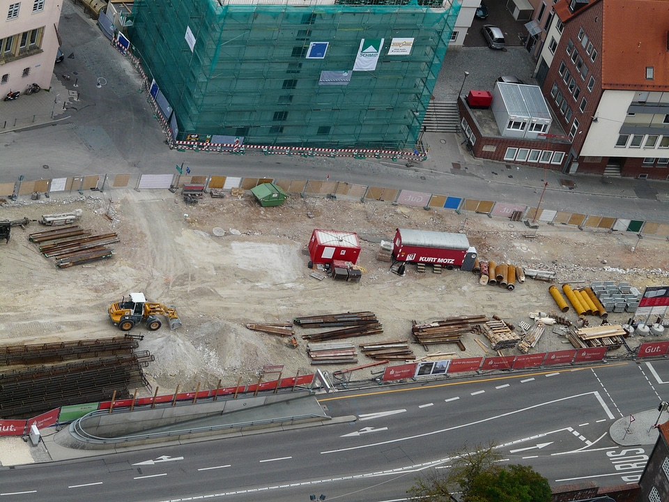 Excavators pave leveling