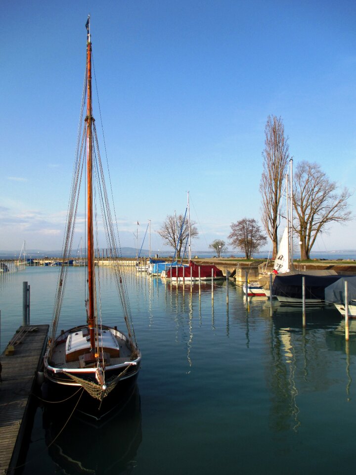 Beautiful wooden mast boat harbour
