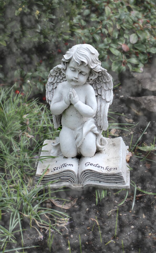 Grave figure sculpture
