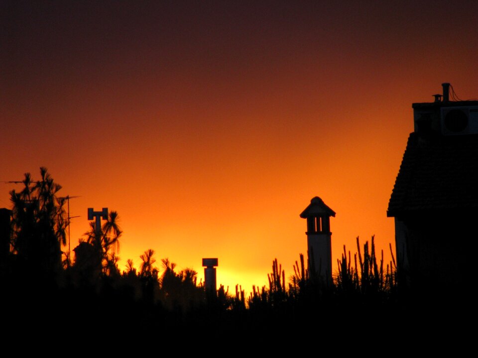 Silhouettes cityscape house