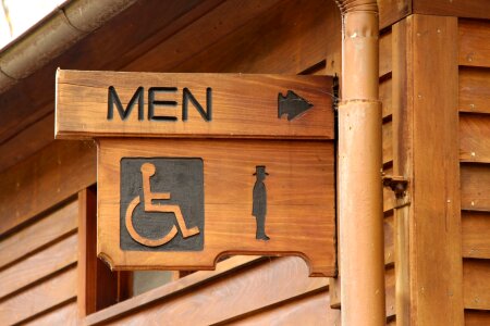 Sign men point