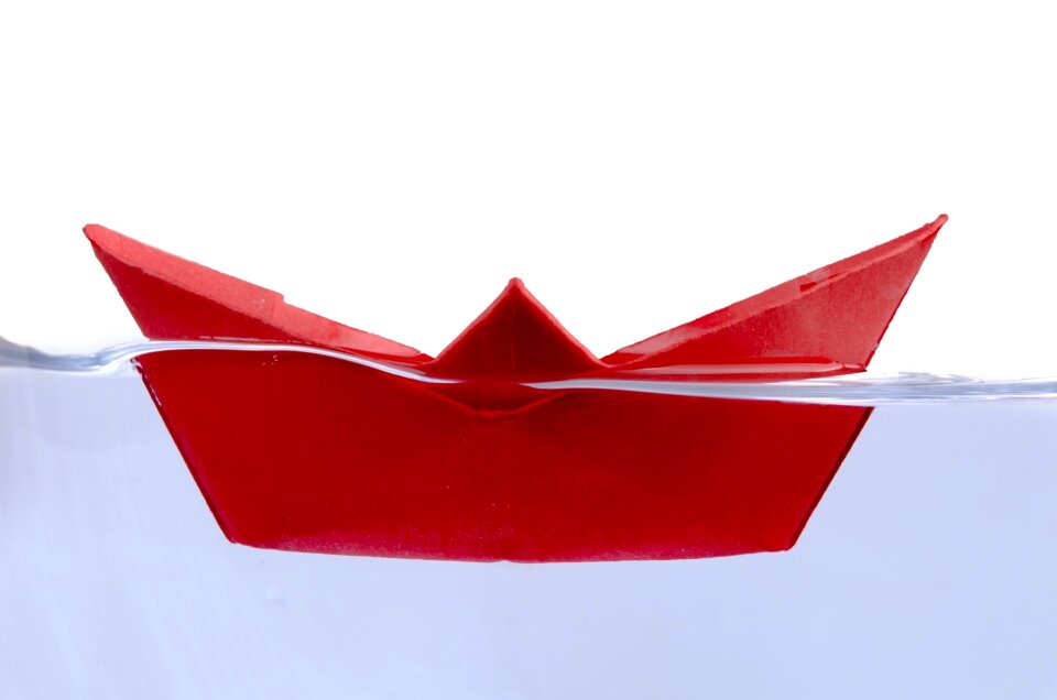 Water red paper boat