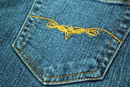 Embroidery jeans pants photo
