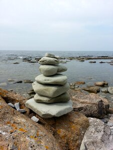 Pebble beach landscapes sea stack photo