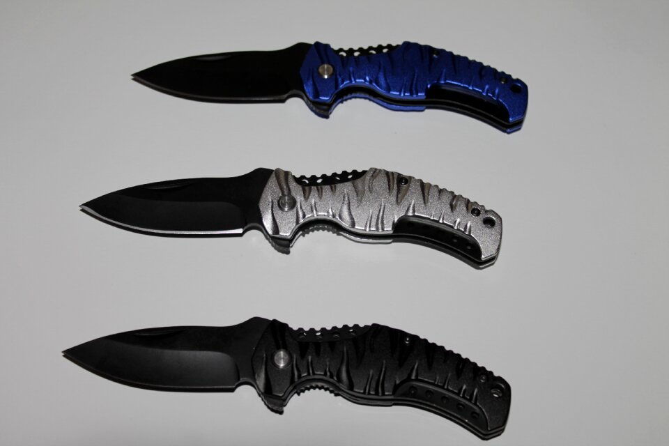 Pocket knife metal one handed knife photo