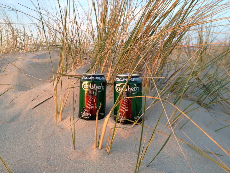 Beer cans beach dune